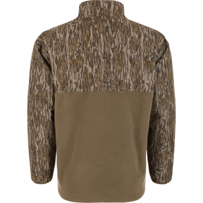 Back view of a Spoonie Eqwader Quarter Zip, featuring a tree-bark camouflage pattern on the upper portion and solid olive green fabric on the lower torso.