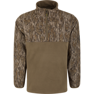 Spoonie Eqwader Quarter Zip pullover in Mossy Oak Bottomland featuring Refuge HS fabric with a brown fleece lower section and a woodland camouflage upper section, collar, and sleeves.