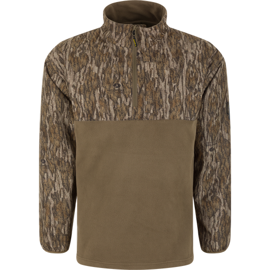 Spoonie Eqwader Quarter Zip pullover in Mossy Oak Bottomland featuring Refuge HS fabric with a brown fleece lower section and a woodland camouflage upper section, collar, and sleeves.