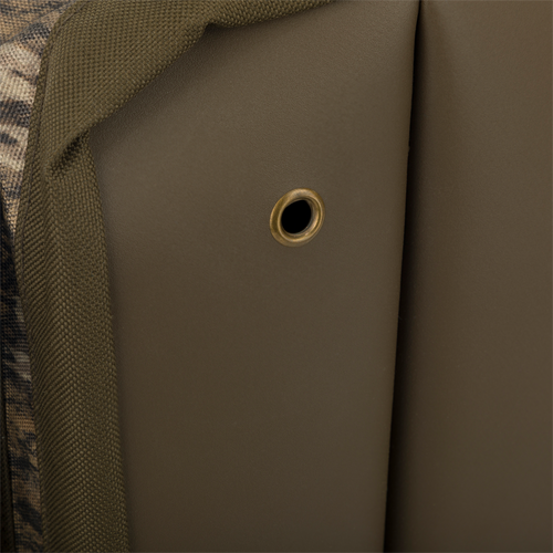 A close-up of the Large Blind Bag by Drake Waterfowl, featuring 18 pockets for organizing gear. Waterproof construction with durable materials and adjustable straps. Dimensions: 18