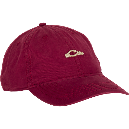 Cotton Twill Logo Cap - A low-profile red hat with a gold hand logo. Crafted with 100% cotton twill, leather strap backing with brass buckle, and contoured bill. Perfect for pushing yourself to the limit in style.
