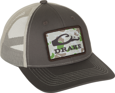 Old School Patch 2.0 Mesh Back Cap - A stylish hat with a patch featuring a snake. 6-panel structured crown, pre-curved visor, and adjustable snap-back closure.