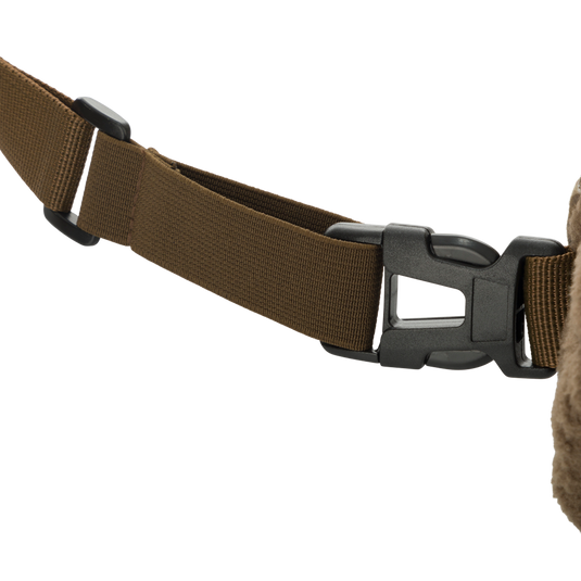 Close-up of the waist belt and quick-release buckle on the Handwarmer Muff with Agion Active XL, showcasing its adjustable and detachable features.