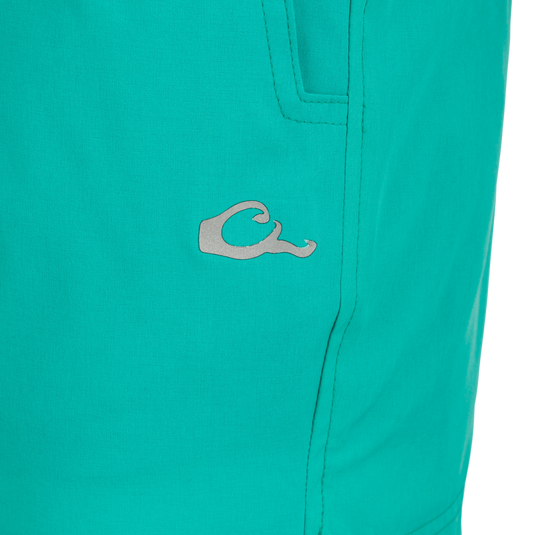 Women's Commando Lined Short 4.5": A close-up of versatile shorts with scalloped hem, slash and back pockets, and a built-in liner.