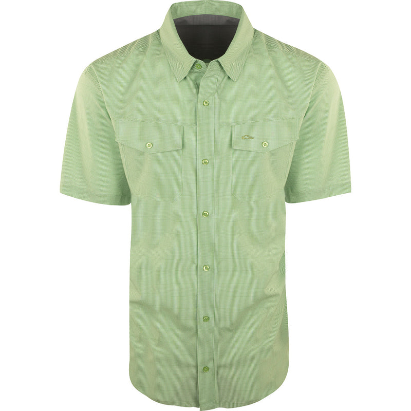 A lightweight, wrinkle-resistant Traveler's Check Shirt S/S with moisture-wicking fabric and 2 chest pockets. Ideal for the man on the go.