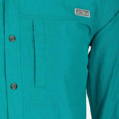 Classic Seersucker Minicheck Shirt: Close-up of a soft, featherweight shirt with hidden button-down collar, zippered chest pocket, and split tail hem.