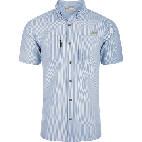 Classic Seersucker Stripe Shirt S/S: A button-down shirt with blue and white stripes, made from performance fabric for moisture-wicking and sun protection. Features include hidden zippered chest pocket, Magnattach™ closure, vented cape back, and split tail hem.