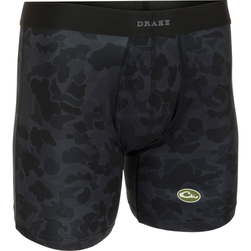 A close-up of the Commando Boxer Brief, a black camouflage underwear with a functional fly and elastic waistband. Made with moisture-wicking fabric and four-way stretch for total freedom of movement.