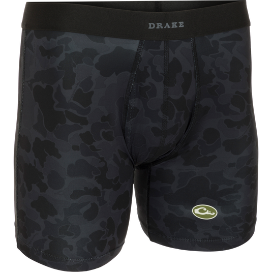 A close-up of the Commando Boxer Brief, a black camouflage underwear with a functional fly and elastic waistband. Made with moisture-wicking fabric and four-way stretch for total freedom of movement.