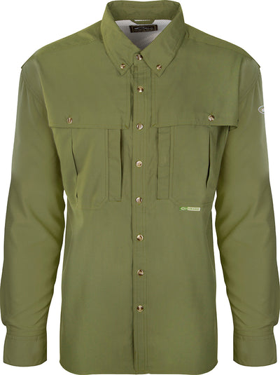 A close-up of the Youth Flyweight Wingshooter's Shirt, a green shirt with buttons. Lightweight, quick-drying, and easy to clean, this comfortable and stylish shirt is perfect for active kids at school, play, and in the outdoors. Made with 100% Polyester twill fabric and featuring a Magnattach™ left chest pocket, front and back heat vents, a sun blocker extension collar, and more. Ideal for waterfowl family adventures.