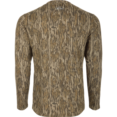 A long sleeved shirt with a tree pattern, designed for optimum comfort and durability. Made of 92% Polyester/8% Spandex with 4-Way Stretch for flexibility. Features Shield 4 Sun™ UPF 50+, Shield 4 Coolant™, Shield 4 Odor™, and Shield 4 Stains™ treatments for protection from the sun, heat, odors, and stains.