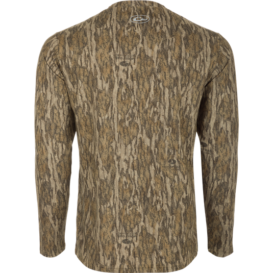 A long sleeved shirt with a tree pattern, designed for optimum comfort and durability. Made of 92% Polyester/8% Spandex with 4-Way Stretch for flexibility. Features Shield 4 Sun™ UPF 50+, Shield 4 Coolant™, Shield 4 Odor™, and Shield 4 Stains™ treatments for protection from the sun, heat, odors, and stains.