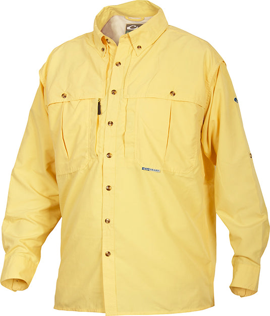A lightweight, wrinkle-resistant Youth Wingshooter's Shirt with multiple pockets and a vented design for air circulation. Perfect for active kids, school, play, and hunting. Made with EasyCare™ fabric and a poly-mesh lining.