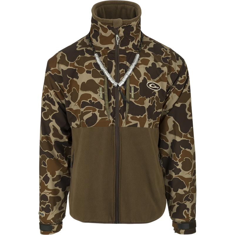 MST Guardian Eqwader Flex Fleece Full Zip Jacket: A camouflage jacket with upper torso and arm protection made of waterproof/windproof/breathable Guardian Flex™ fabric, and a lower body of 350-gram polyester fleece for enhanced breathability under waders. Features include no-water cuff closures, improved fit for range-of-motion, and multiple pockets.