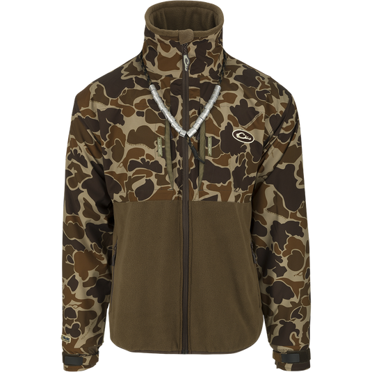 MST Guardian Eqwader Flex Fleece Full Zip Jacket: A camouflage jacket with upper torso and arm protection made of waterproof/windproof/breathable Guardian Flex™ fabric, and a lower body of 350-gram polyester fleece for enhanced breathability under waders. Features include no-water cuff closures, improved fit for range-of-motion, and multiple pockets.