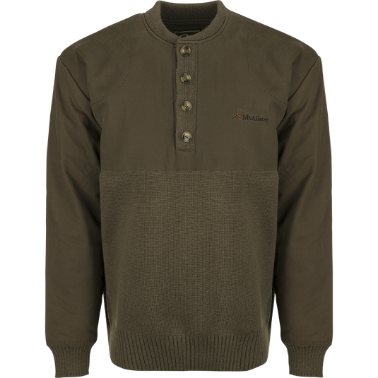 A close-up of the McAlister Waterfowler's Sweater, a green wool pullover with a 4-button quarter placket. Rib-knit cuffs and hem provide a stylish and comfortable fit.